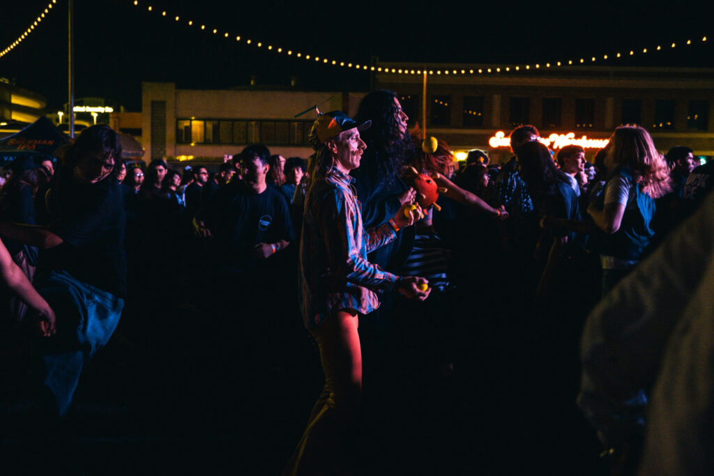 Alex "Stitches" Pugh juggles in the mosh pit as The Garden performs
